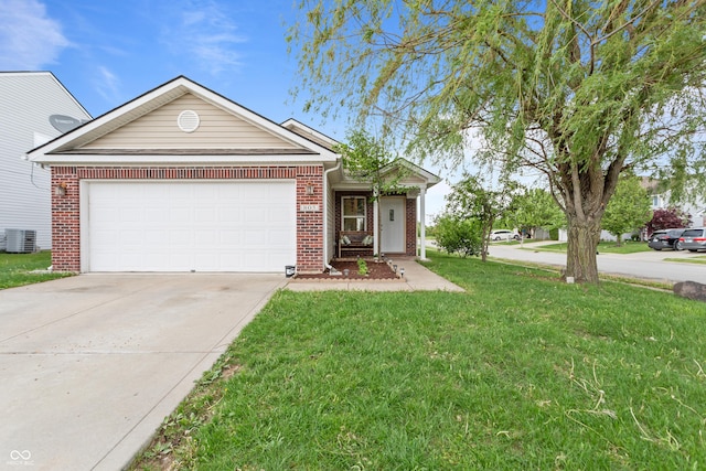 805 Sunvista Dr, Avon, IN 46123 - view of front of house featuring brick siding, central AC, a front yard, concrete driveway, and an attached garage