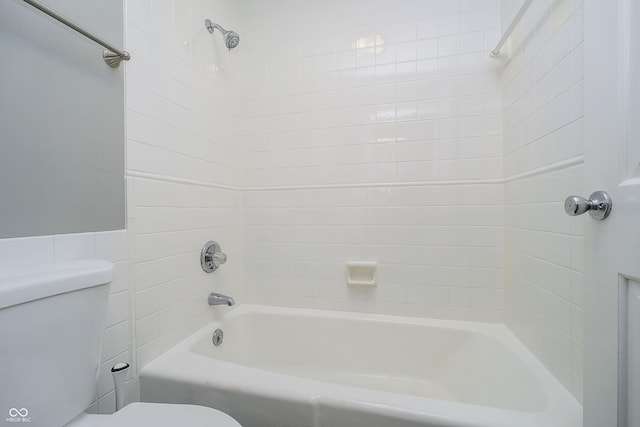 3852 Knollton Rd Unit 3852, Indianapolis, IN 46228 - bathroom with toilet, shower / tub combination, a wainscoted wall, and tile walls