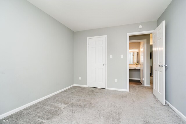 3852 Knollton Rd Unit 3852, Indianapolis, IN 46228 - unfurnished bedroom with baseboards and carpet