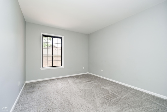 3852 Knollton Rd Unit 3852, Indianapolis, IN 46228 - empty room with carpet floors and baseboards