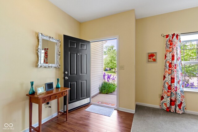 5145 Greenside Dr, Indianapolis, IN 46235 - foyer with baseboards and wood finished floors