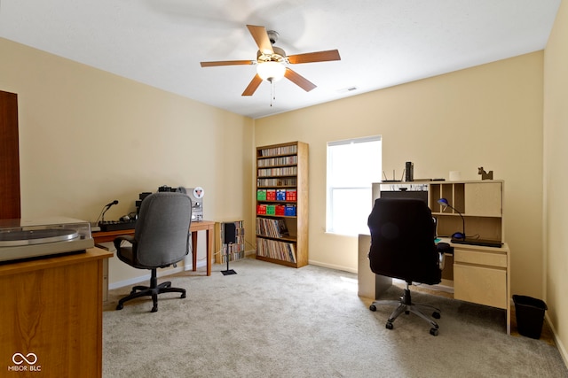 5145 Greenside Dr, Indianapolis, IN 46235 - home office featuring a ceiling fan, light colored carpet, and baseboards