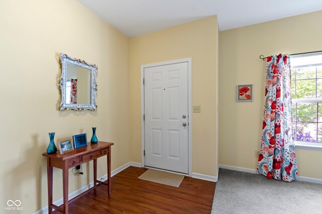 5145 Greenside Dr, Indianapolis, IN 46235 - foyer featuring baseboards and wood finished floors