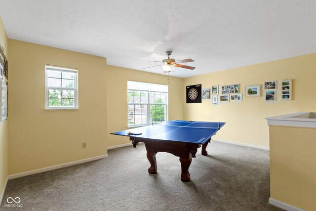 5145 Greenside Dr, Indianapolis, IN 46235 - recreation room featuring a ceiling fan, carpet, and baseboards