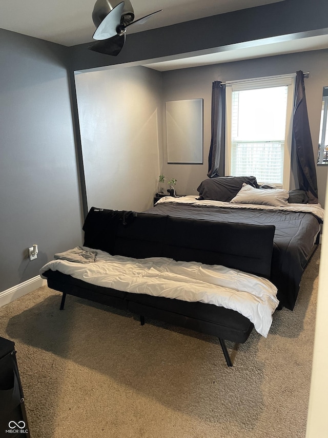 1931 E 68th St, Indianapolis, IN 46220 - bedroom with carpet, baseboards, and ceiling fan