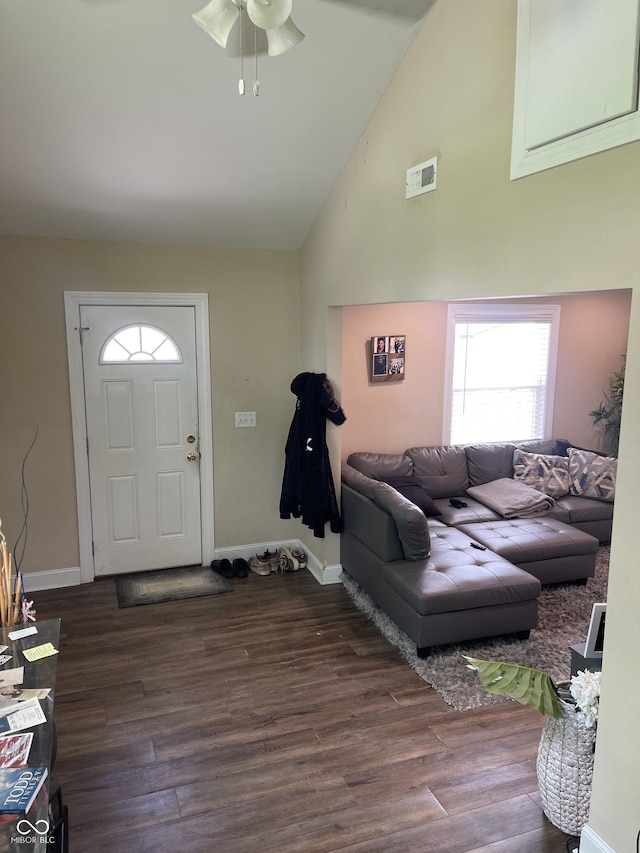 1931 E 68th St, Indianapolis, IN 46220 - entryway with high vaulted ceiling, ceiling fan, dark wood-style flooring, and baseboards