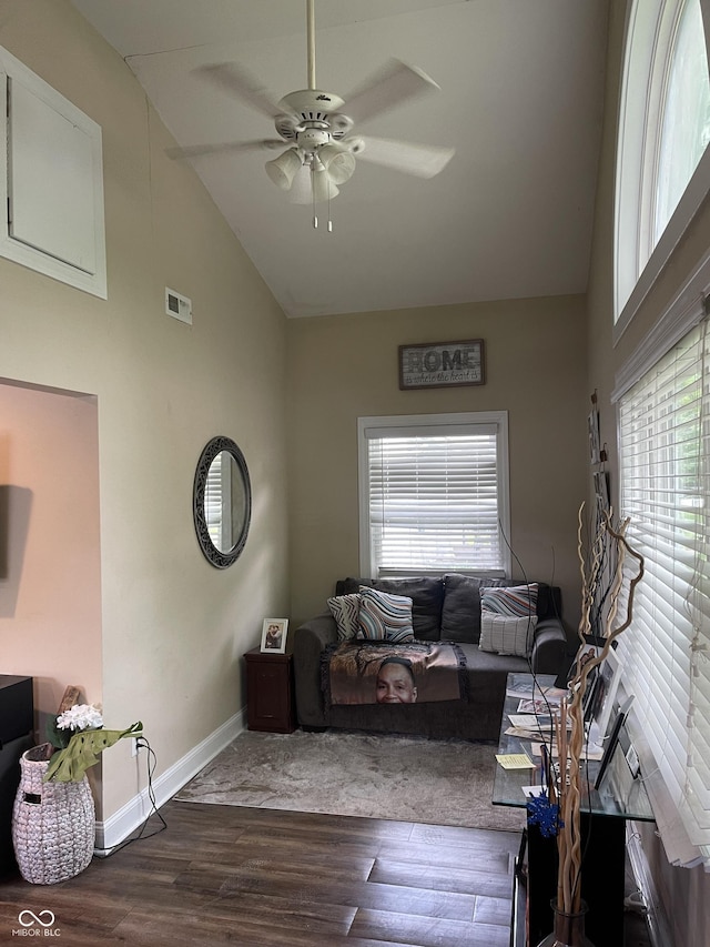 1931 E 68th St, Indianapolis, IN 46220 - living area with high vaulted ceiling, ceiling fan, wood finished floors, healthy amount of natural light, and baseboards
