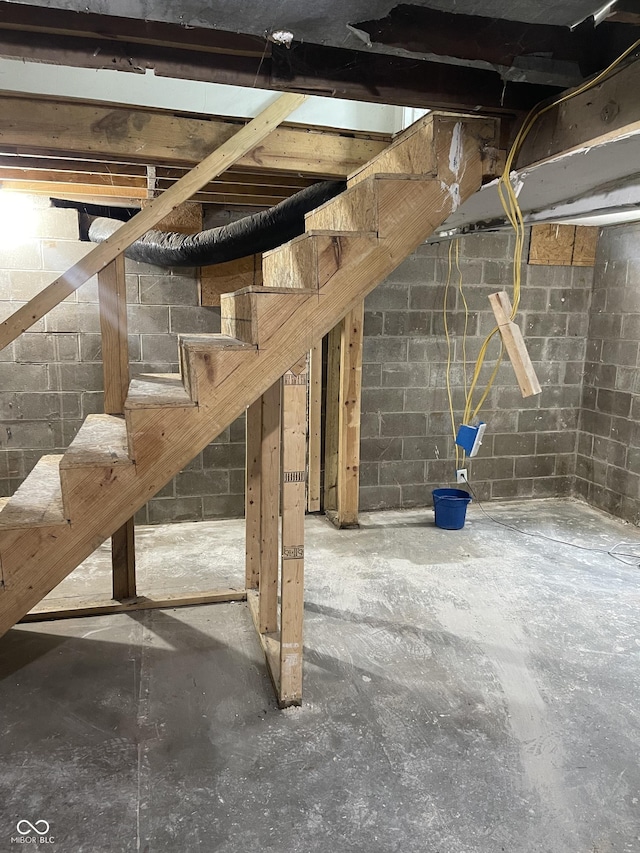 1931 E 68th St, Indianapolis, IN 46220 - below grade area featuring concrete block wall and stairs