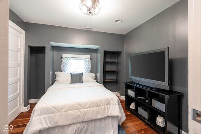 2215 S Delaware St, Indianapolis, IN 46225 - bedroom featuring wood finished floors and baseboards