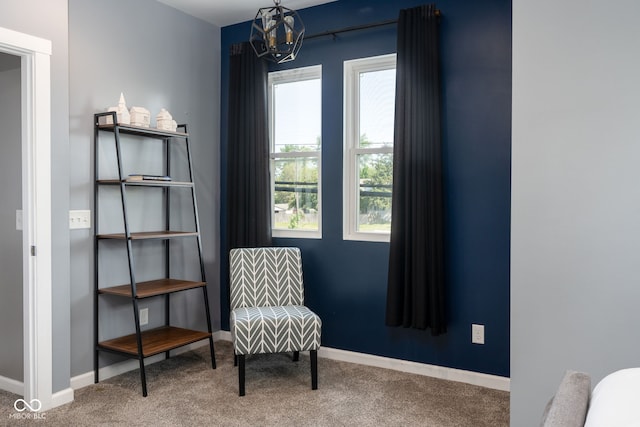 2215 S Delaware St, Indianapolis, IN 46225 - living area with carpet floors, plenty of natural light, baseboards, and a chandelier