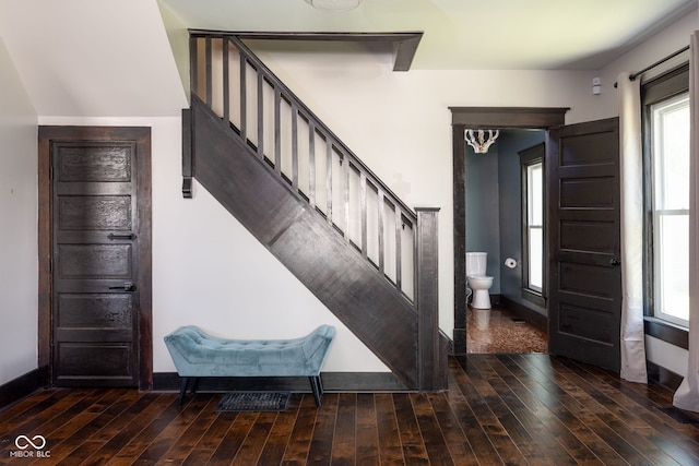 2215 S Delaware St, Indianapolis, IN 46225 - foyer entrance featuring stairway, hardwood / wood-style flooring, and baseboards