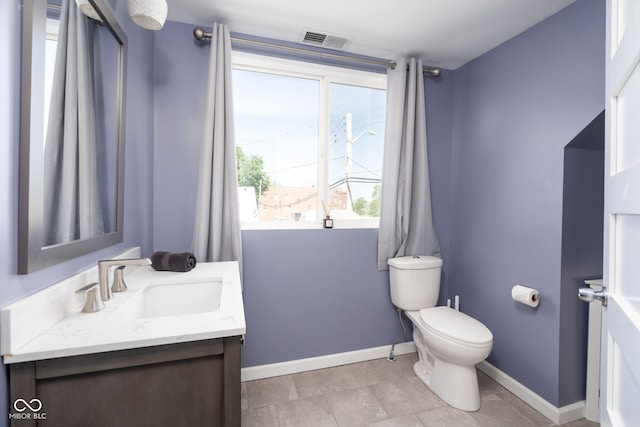 2215 S Delaware St, Indianapolis, IN 46225 - half bath with toilet, vanity, and baseboards