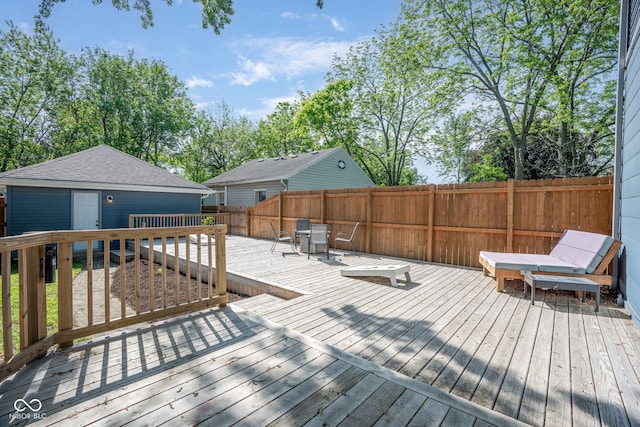 2215 S Delaware St, Indianapolis, IN 46225 - deck featuring outdoor dining area and an outbuilding