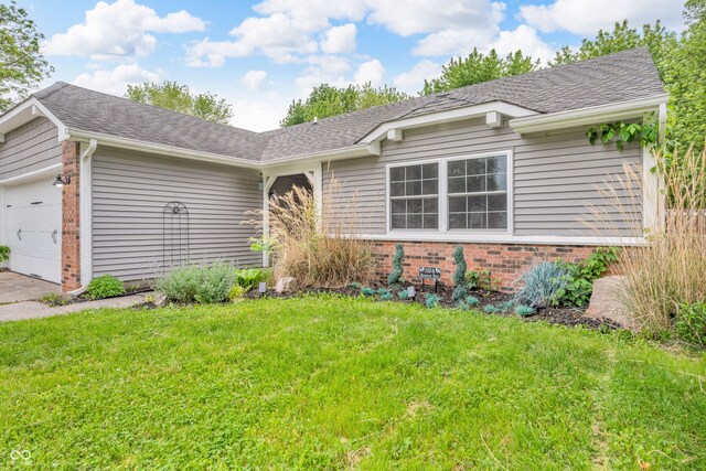 1104 Briarwood Dr, Brownsburg, IN 46112 - single story home with brick siding, a front lawn, an attached garage, roof with shingles, and concrete driveway