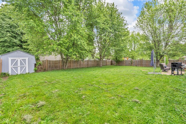 1104 Briarwood Dr, Brownsburg, IN 46112 - view of yard with a shed, an outdoor structure, and a patio