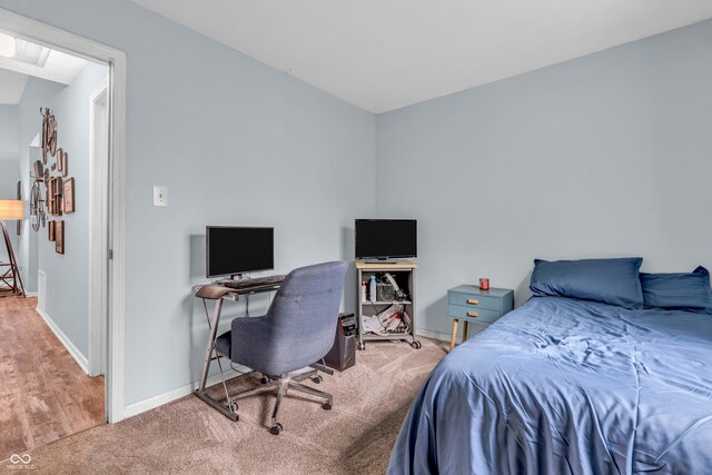 1104 Briarwood Dr, Brownsburg, IN 46112 - carpeted bedroom featuring baseboards and wood finished floors