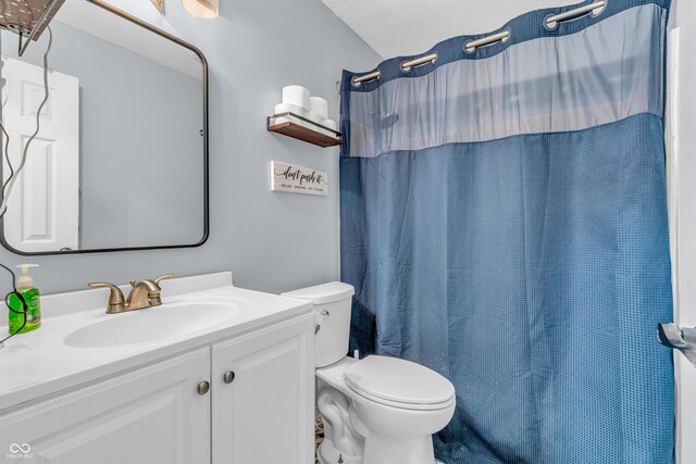 1104 Briarwood Dr, Brownsburg, IN 46112 - full bath with toilet, vanity, and a shower with shower curtain