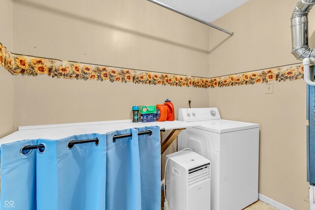 1104 Briarwood Dr, Brownsburg, IN 46112 - washroom with washer / clothes dryer and baseboards