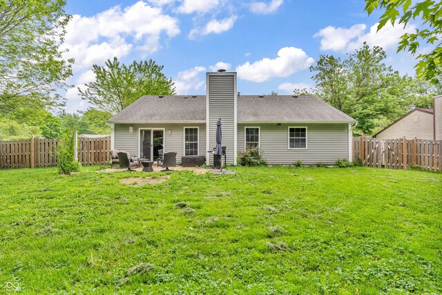 1104 Briarwood Dr, Brownsburg, IN 46112 - rear view of property featuring a chimney, a patio, and roof with shingles