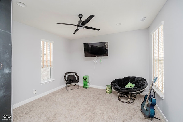 7077 Antiquity Dr, Carmel, IN 46033 - living area with carpet floors, ceiling fan, and baseboards