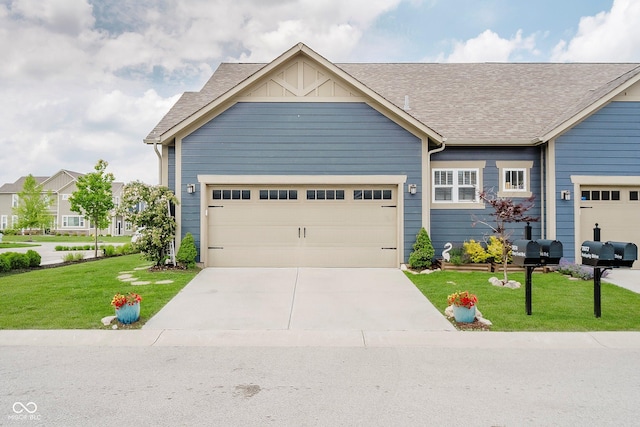 7077 Antiquity Dr, Carmel, IN 46033 - view of front facade with a front lawn, concrete driveway, an attached garage, and roof with shingles