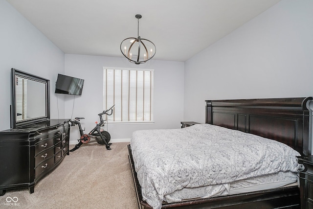 7077 Antiquity Dr, Carmel, IN 46033 - bedroom featuring light colored carpet, a chandelier, and baseboards