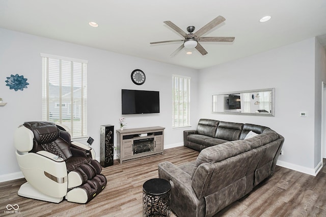 7077 Antiquity Dr, Carmel, IN 46033 - living room with wood finished floors, baseboards, ceiling fan, and recessed lighting