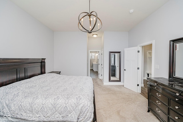 7077 Antiquity Dr, Carmel, IN 46033 - bedroom with light colored carpet and a chandelier