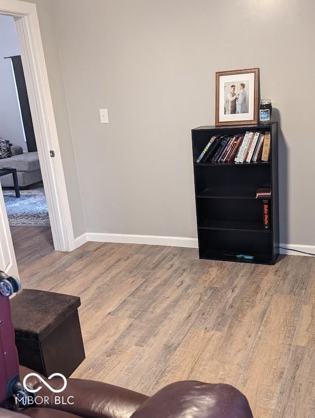 2968 N Arsenal Ave, Indianapolis, IN 46218 - detailed view of wood finished floors and baseboards