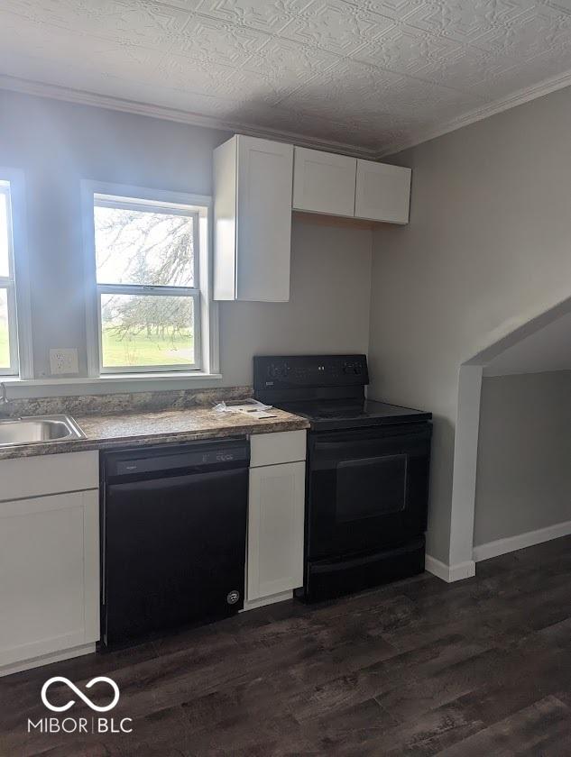 2968 N Arsenal Ave, Indianapolis, IN 46218 - kitchen featuring black appliances, a sink, crown molding, and white cabinetry