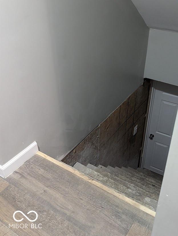 2968 N Arsenal Ave, Indianapolis, IN 46218 - stairway with wood finished floors