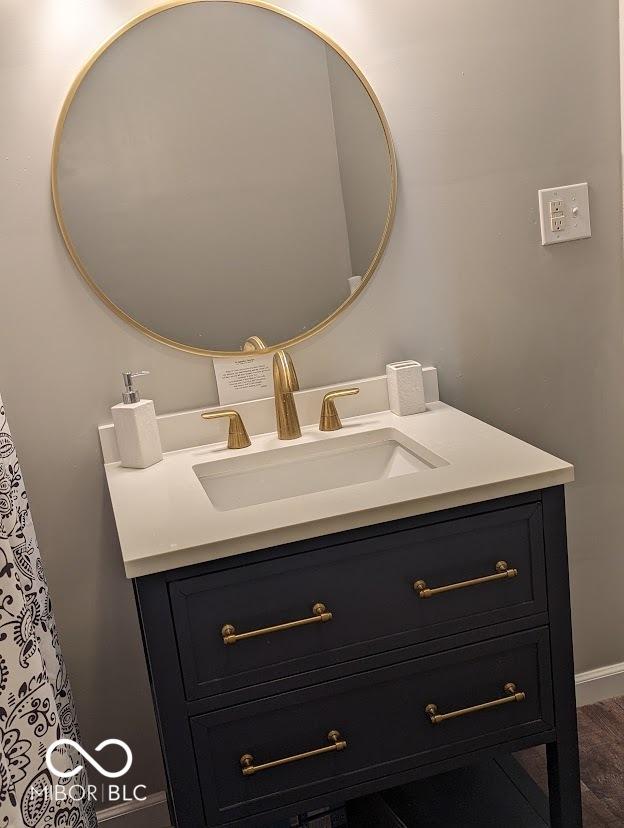 2968 N Arsenal Ave, Indianapolis, IN 46218 - bathroom with vanity