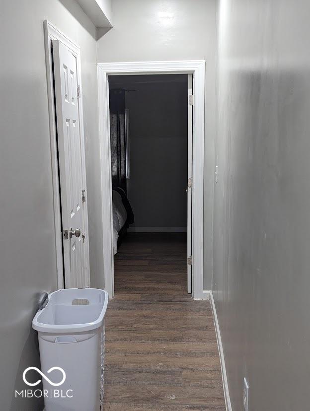 2968 N Arsenal Ave, Indianapolis, IN 46218 - hall featuring wood finished floors and baseboards