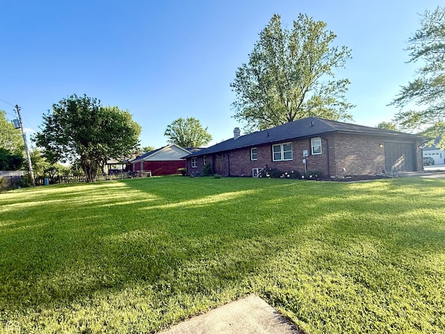 1328 N 300 E, Anderson, IN 46012 - view of yard with a garage