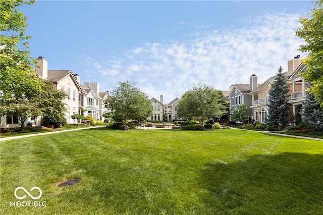 654 N Senate Ave, Indianapolis, IN 46202 - surrounding community with a residential view and a yard