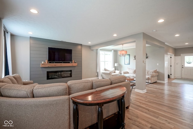 548 Gosford Ct, Westfield, IN 46074 - living room featuring recessed lighting, light wood-style floors, and a large fireplace