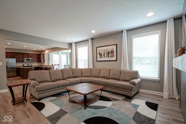 548 Gosford Ct, Westfield, IN 46074 - living area featuring light wood-style flooring and recessed lighting