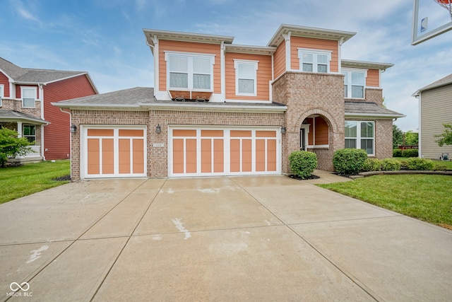 548 Gosford Ct, Westfield, IN 46074 - view of front of home featuring brick siding, driveway, and a front lawn