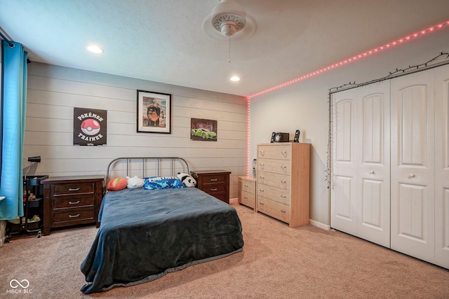 548 Gosford Ct, Westfield, IN 46074 - bedroom featuring light colored carpet, recessed lighting, wood walls, and ceiling fan