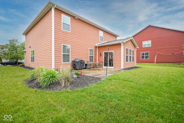 548 Gosford Ct, Westfield, IN 46074 - back of property featuring a patio and a lawn