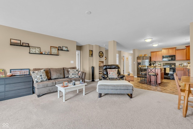 10731 Jimmy Lake Dr, Indianapolis, IN 46239 - living room featuring light colored carpet