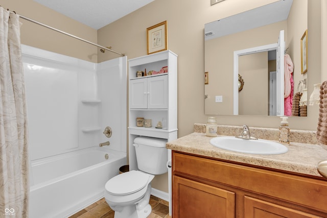 10731 Jimmy Lake Dr, Indianapolis, IN 46239 - bathroom with shower / bath combo with shower curtain, vanity, toilet, and tile patterned flooring