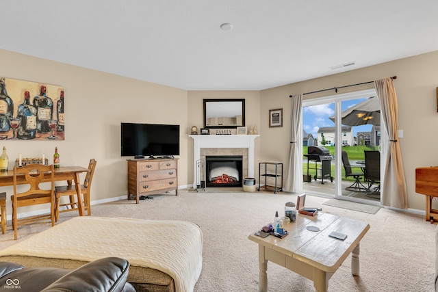 10731 Jimmy Lake Dr, Indianapolis, IN 46239 - living room with carpet flooring, a tile fireplace, and baseboards