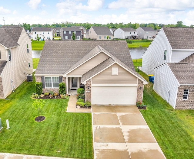 10731 Jimmy Lake Dr, Indianapolis, IN 46239 - traditional-style house featuring brick siding, a residential view, central air condition unit, an attached garage, and concrete driveway