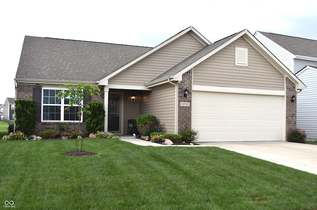 10731 Jimmy Lake Dr, Indianapolis, IN 46239 - view of front of property with driveway, a garage, brick siding, a front lawn, and roof with shingles