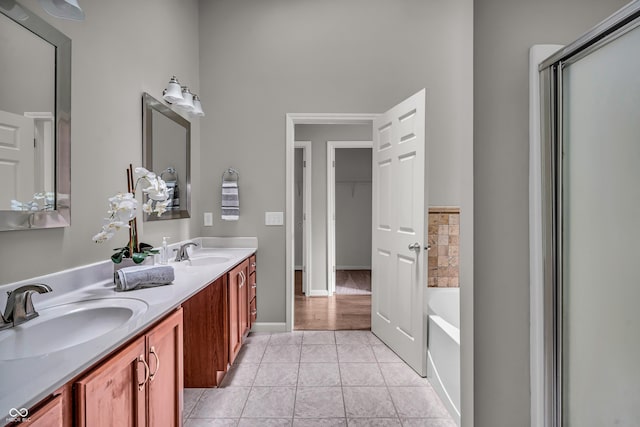 1064 Reserve Way, Indianapolis, IN 46220 - full bath with a garden tub, double vanity, and tile patterned flooring