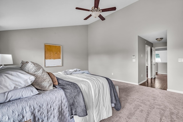 1064 Reserve Way, Indianapolis, IN 46220 - bedroom with vaulted ceiling, carpet flooring, baseboards, and ceiling fan
