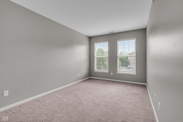 1064 Reserve Way, Indianapolis, IN 46220 - carpeted empty room with baseboards