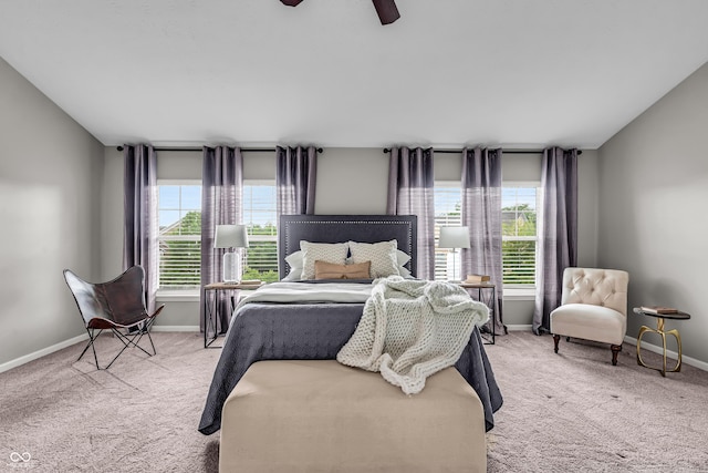 1064 Reserve Way, Indianapolis, IN 46220 - bedroom with light colored carpet, baseboards, and ceiling fan