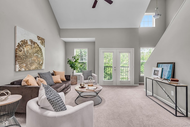 1064 Reserve Way, Indianapolis, IN 46220 - living area with high vaulted ceiling, a ceiling fan, and carpet